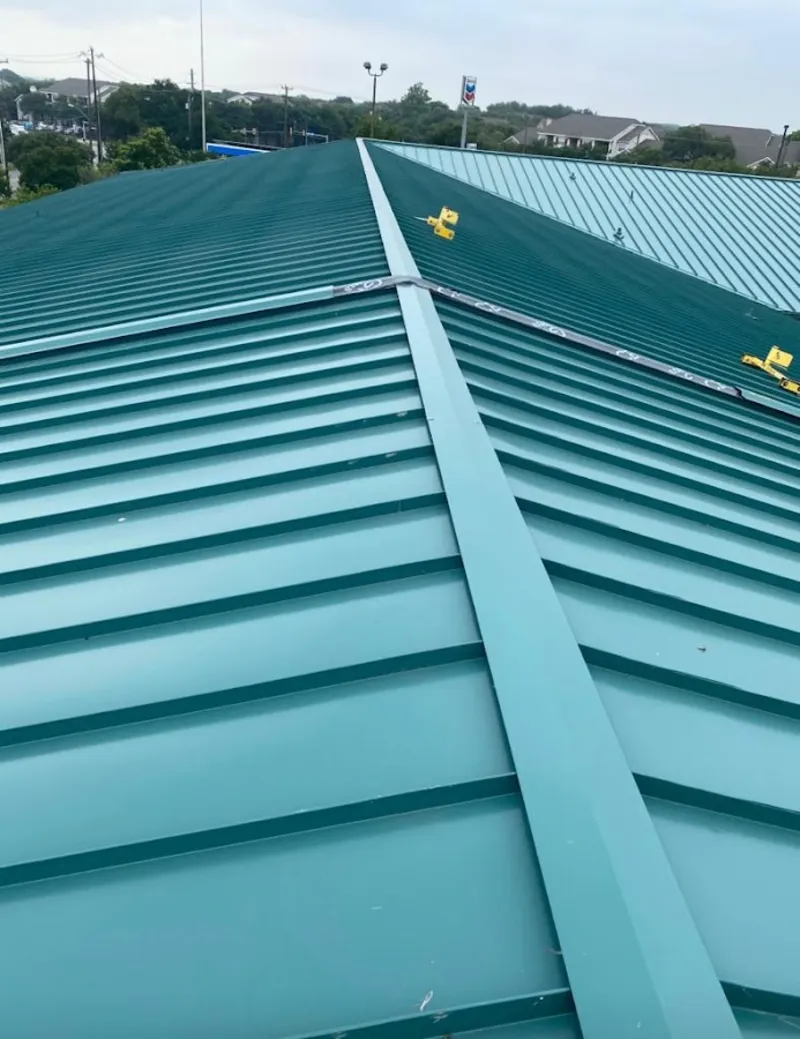Green commercial metal roof ridge and valley for Metal Roof Repair in Mercedes